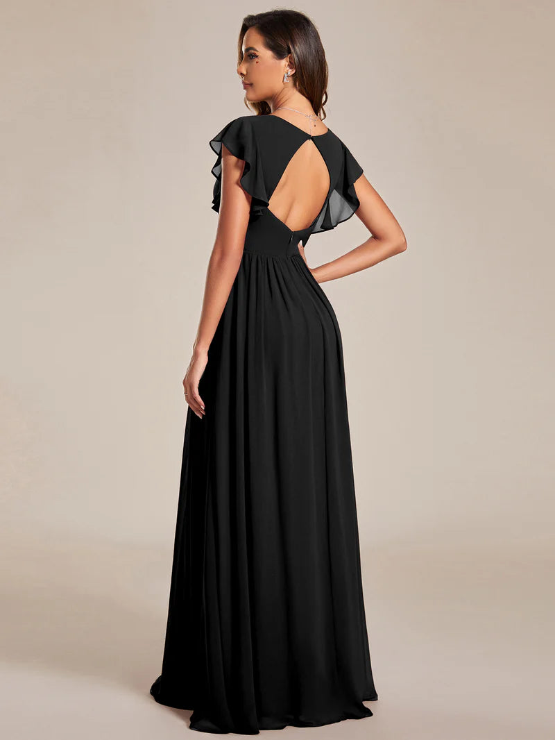Black bridesmaid dress with ruffle sleeve and open back detail.
