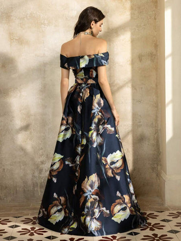 Black floral formal dress with off shoulder sleeve and front split.