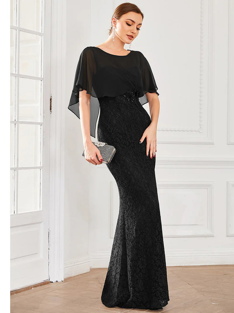 Black Mother of the Bride dress with fishtail finish, lace with chiffon cape ruffle sleeves. Graceful Elegance bridal shop services Logan, Brisbane, Gold Coast, Scenic Rim.