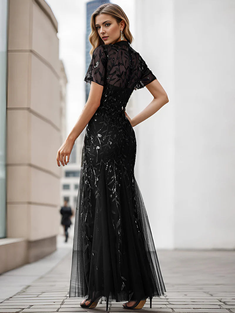 Black Mother of the bride or formal dress, short sleeve with tulle, lace and sequin detailing.