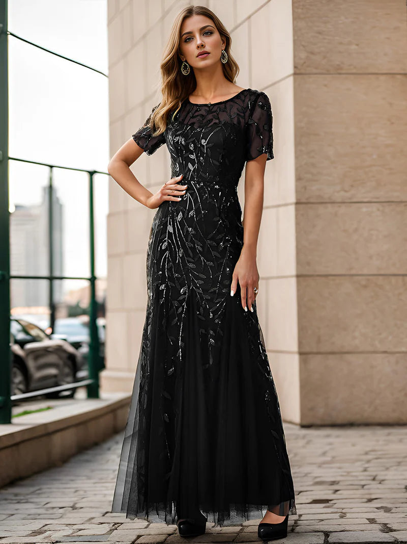 Black Mother of the bride or formal dress, short sleeve with tulle, lace and sequin detailing.