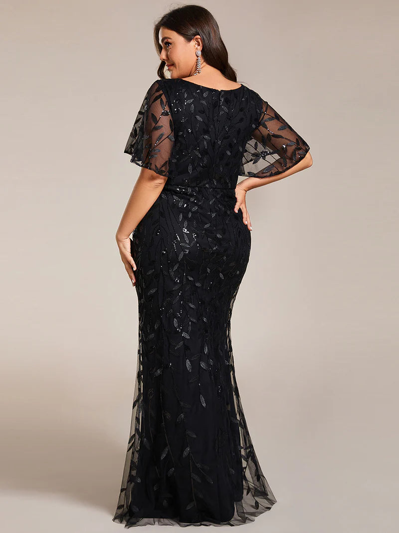 Black Plus Size Mother of the bride or formal dress with tulle, sequins and lace ruffle sleeves.