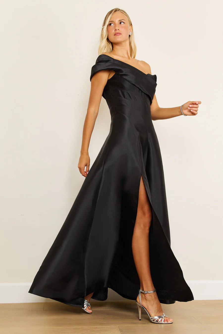 Black one shoulder formal dress with a split. Plus size size available.