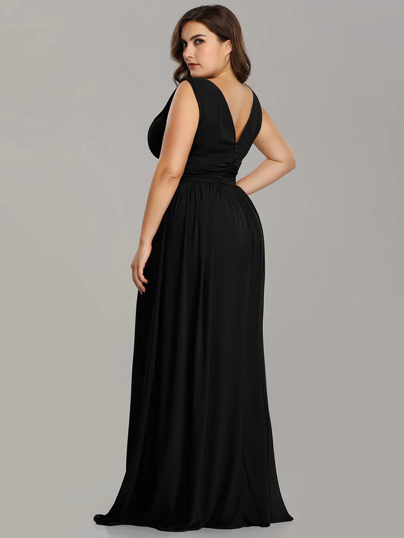 Black plus sized bridesmaid dress with double v-neck and chiffon.
