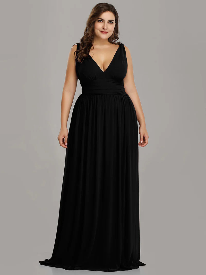 Black plus sized bridesmaid dress with double v-neck and chiffon.