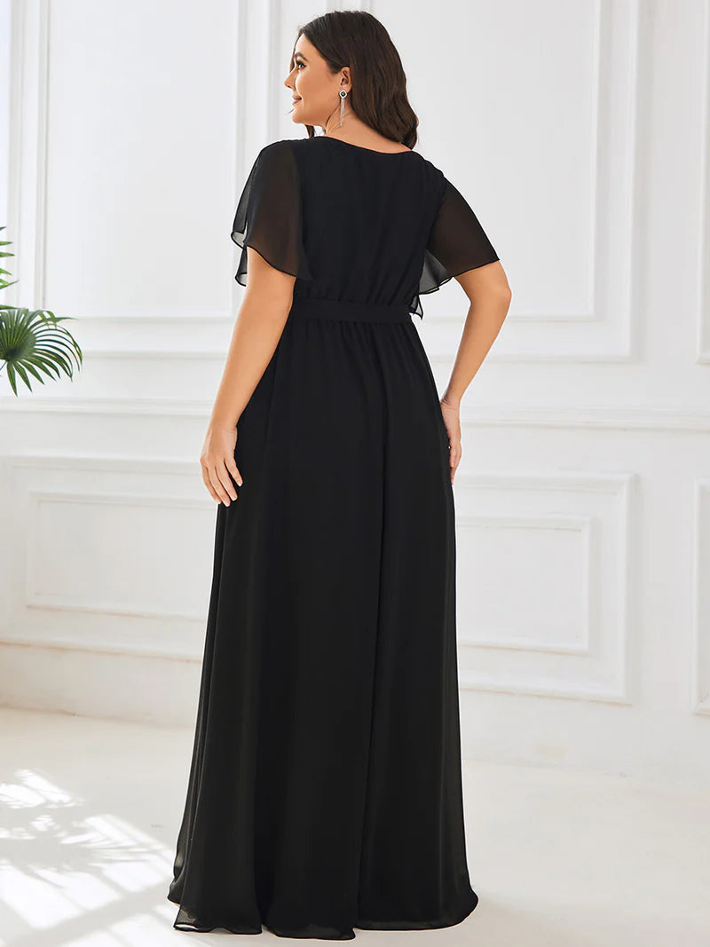 Black plus sized bridesmaid dress with v-neck and a-line.