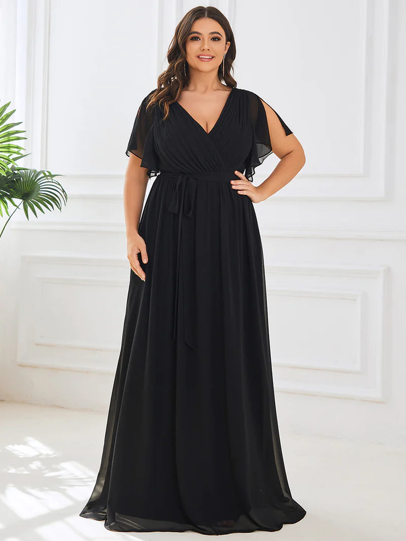Black plus sized bridesmaid dress with v-neck and a-line.
