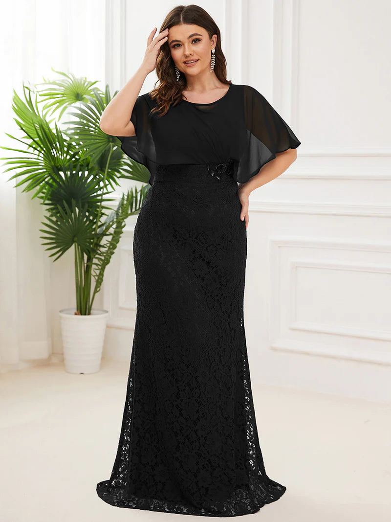 Black Mother of the Bride dress in plus size with fishtail finish, lace with chiffon cape ruffle sleeves. Graceful Elegance bridal shop services Logan, Brisbane, Gold Coast, Scenic Rim.