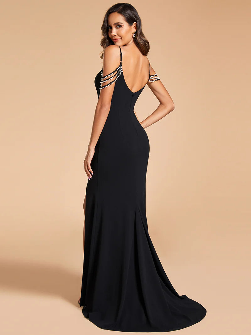 Black wedding dress with cap sleeves and mermaid train.