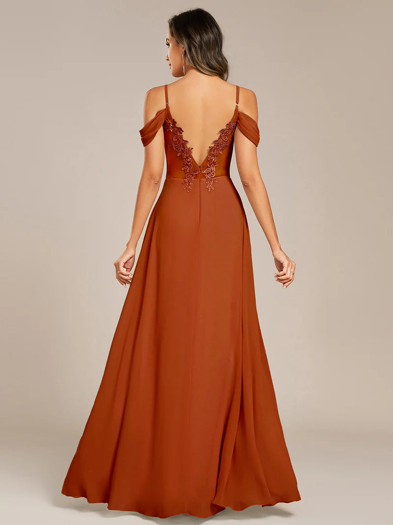 Burnt orange bridesmaid dress with a A-line and spaghetti straps.