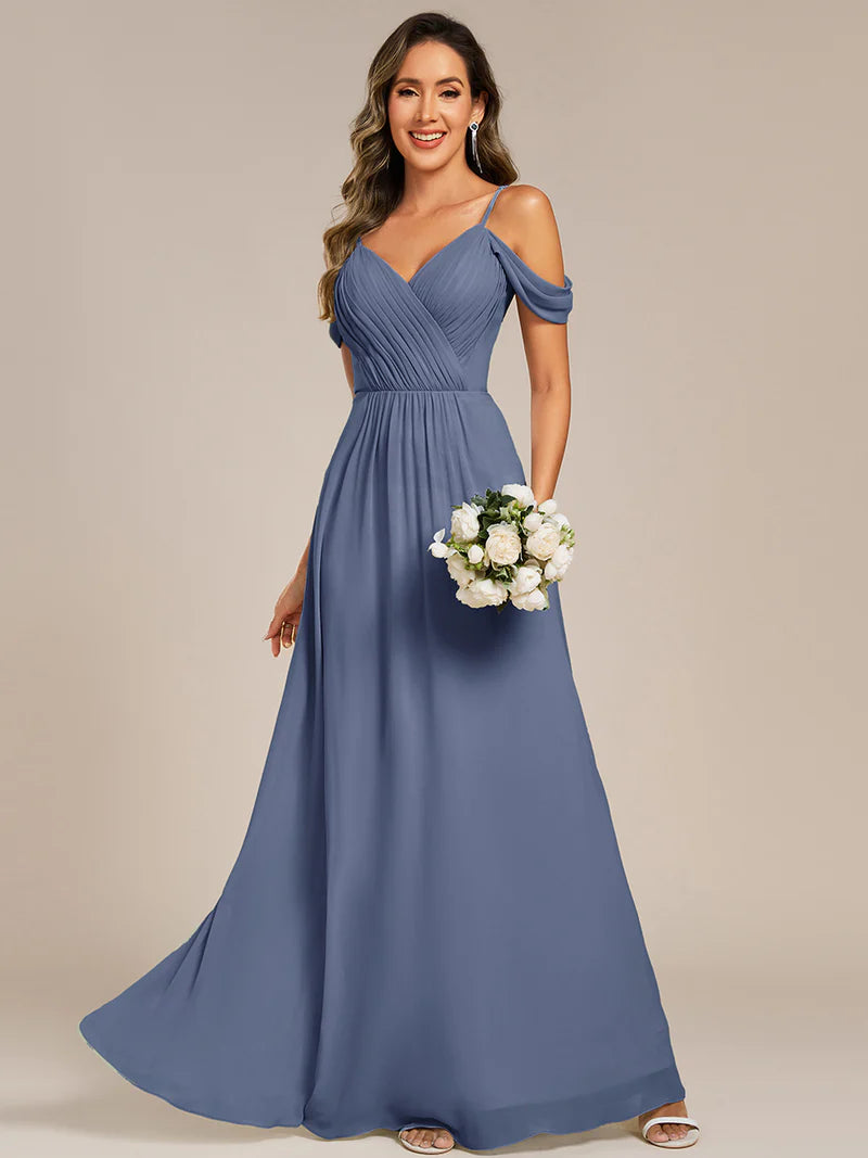 Dusty blue bridesmaid dress with a A-line and spaghetti straps.