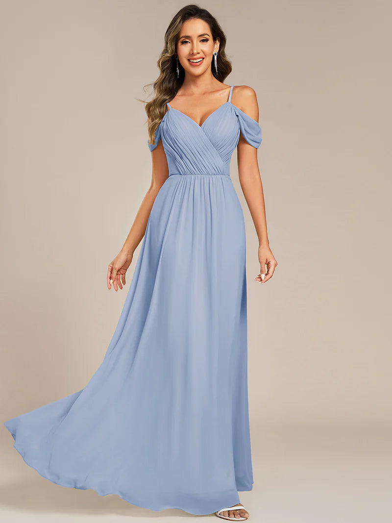 Ice blue bridesmaid dress with a A-line and spaghetti straps.