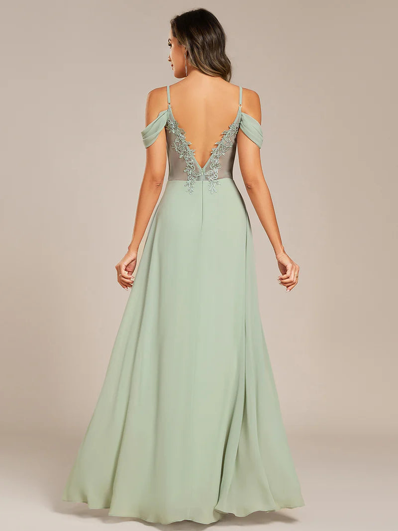 Mint green bridesmaid dress with a A-line and spaghetti straps.