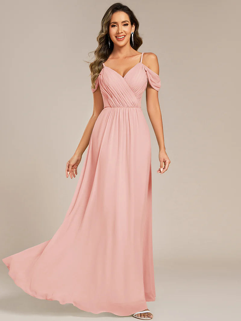 Pink bridesmaid dress with a A-line and spaghetti straps.