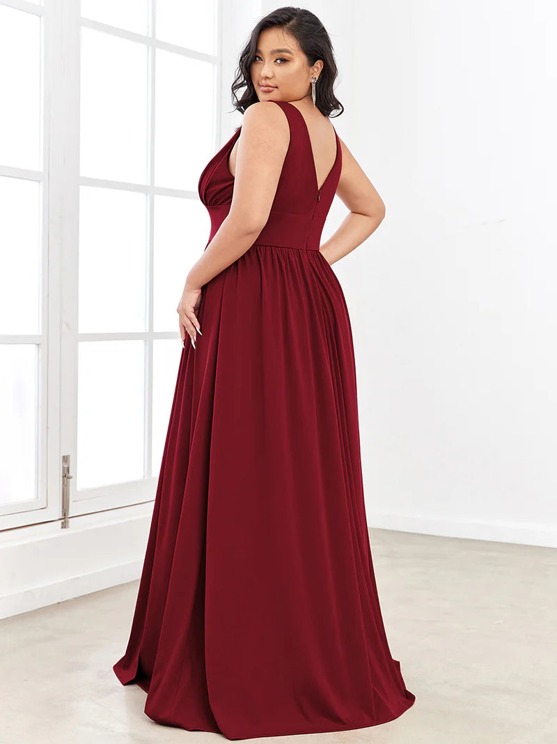 Plus sized burgundy red bridesmaid dress with sleeveless and deep v-neck.