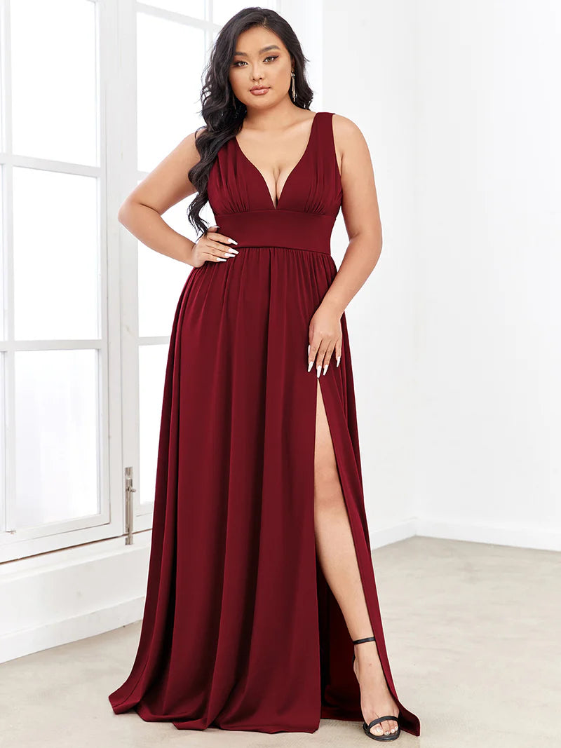 Plus sized burgundy red bridesmaid dress with sleeveless and deep v-neck.