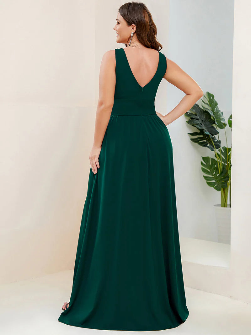 Plus sized dark green bridesmaid dress with sleeveless and deep v-neck.