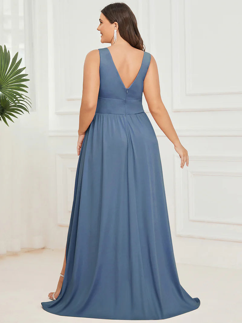 Plus sized dusty blue bridesmaid dress with sleeveless and deep v-neck.
