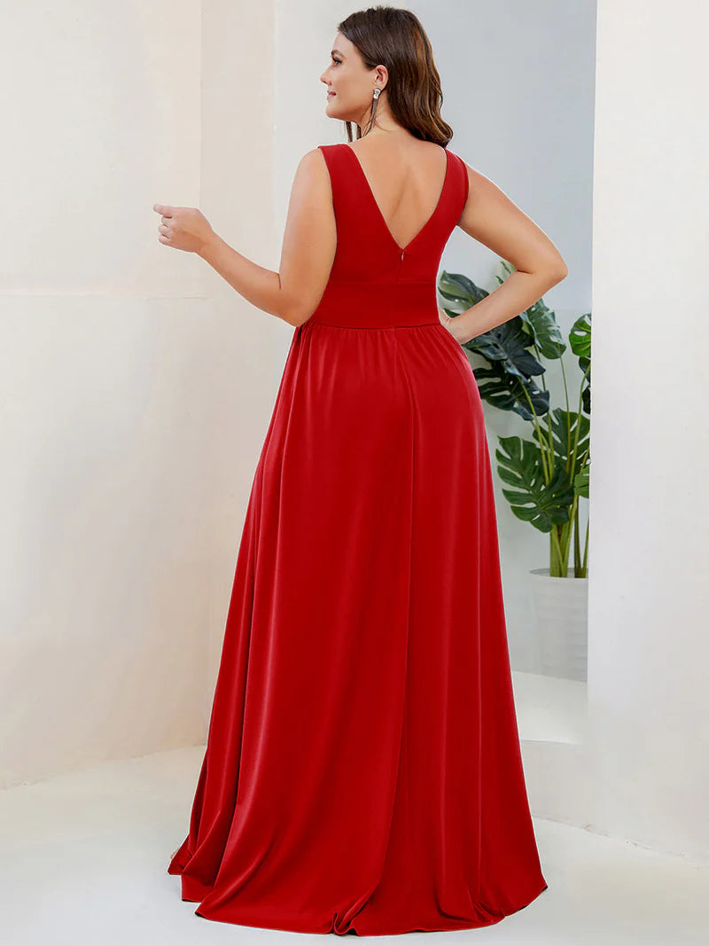Plus sized red bridesmaid dress with sleeveless and deep v-neck.