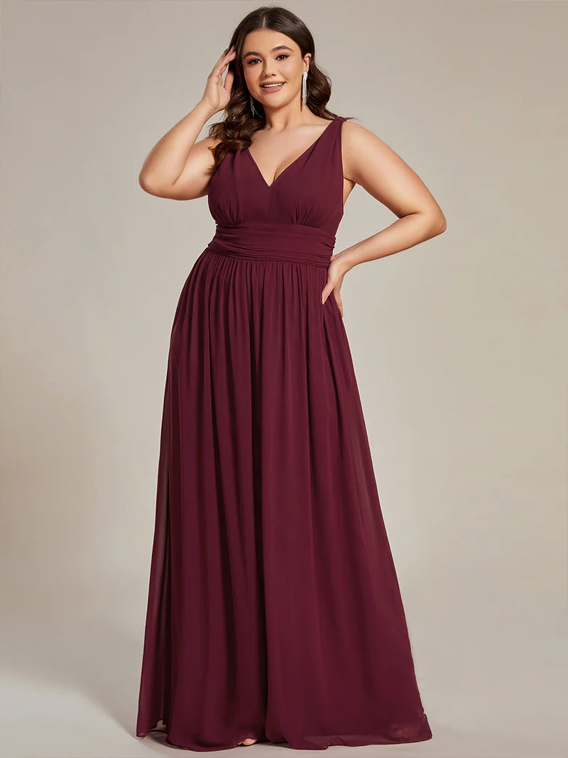 Burgundy red plus sized bridesmaid dress with double v-neck and chiffon.
