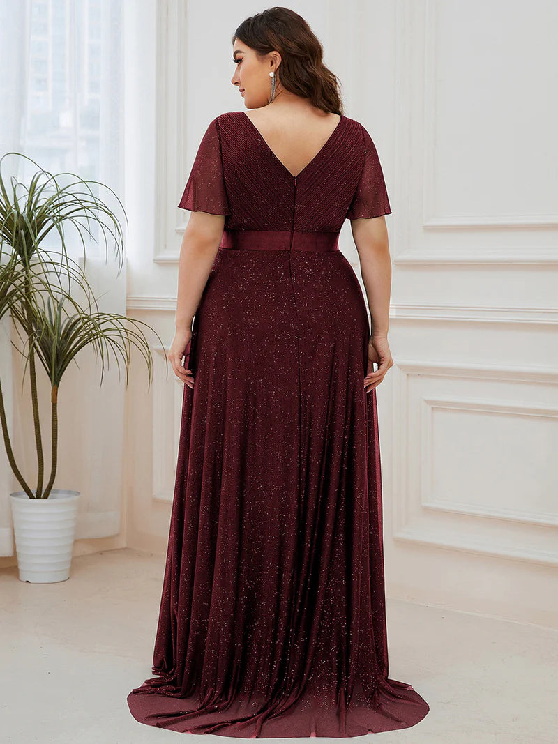 Burgundy shimmer plus size formal dress with satin band.