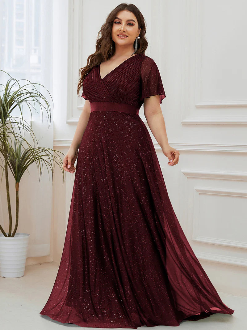 Burgundy shimmer plus size formal dress with satin band.
