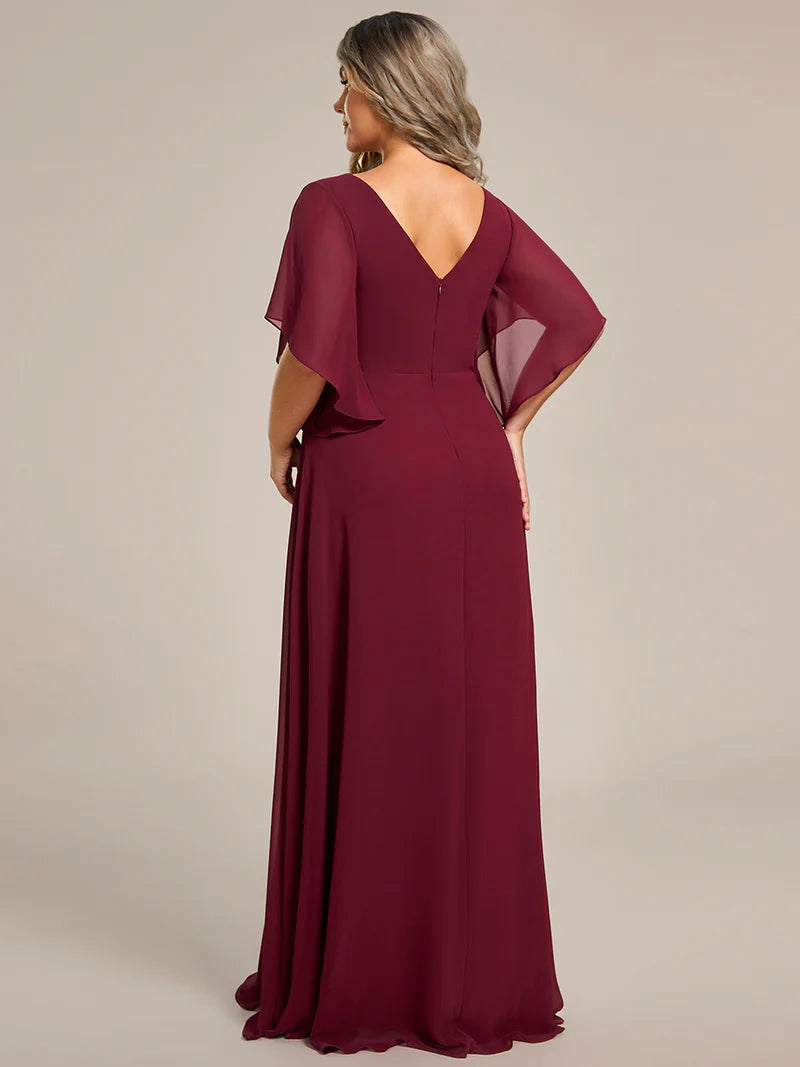 Burgundy red embroidered mother of the bride or bridesmaid chiffon sleeve dress.