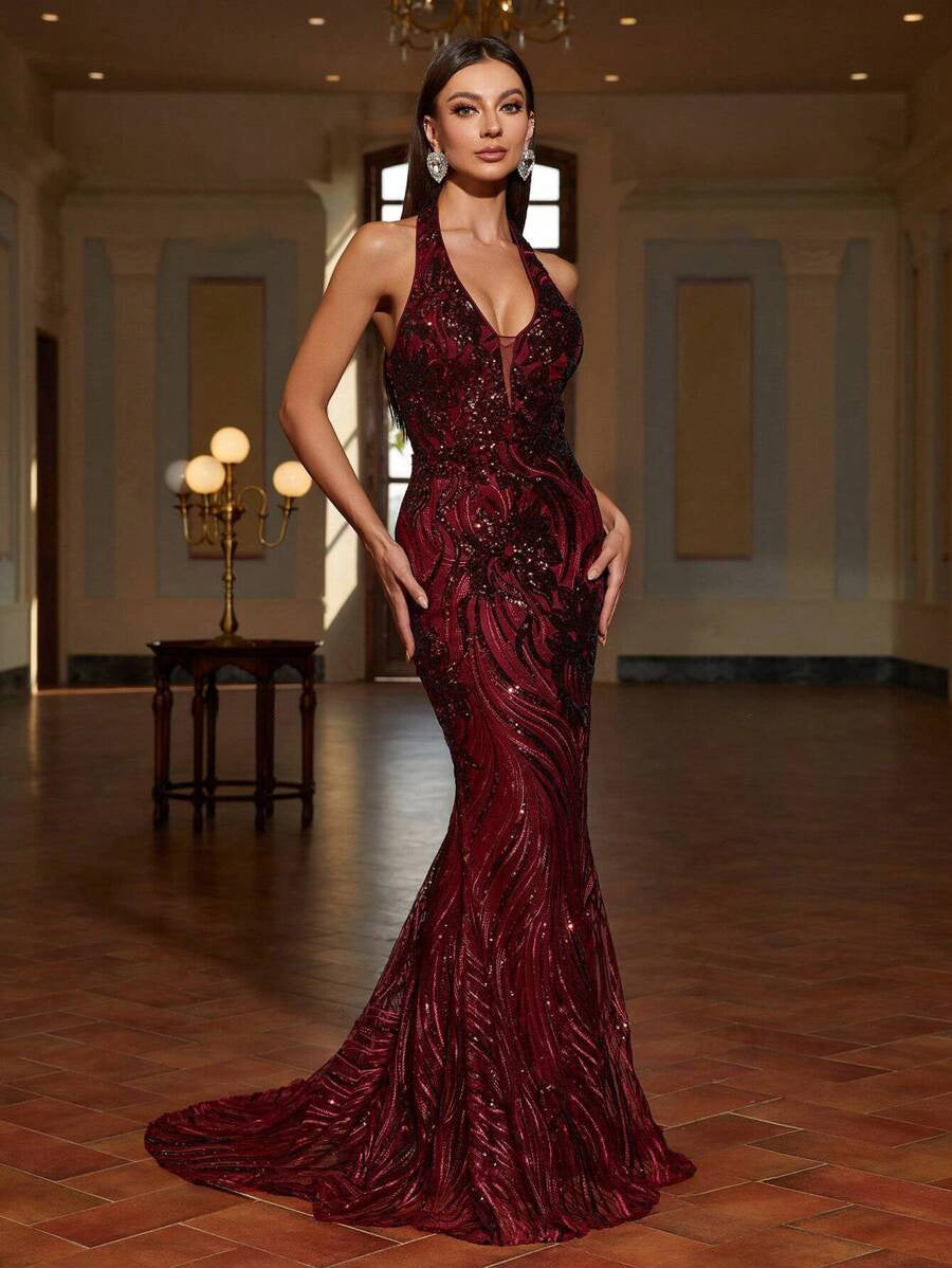 Burgundy red halter neck sequin formal dress with low back and mermaid tail finish. Graceful Elegance services Logan, Brisbane, Gold Coast, Scenic Rim.