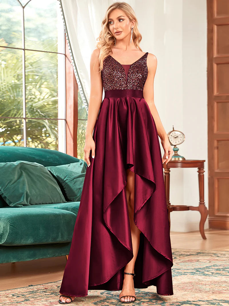 Burgundy red hi low sleeveless satin formal or mother of the bride dress with bodice detailing.