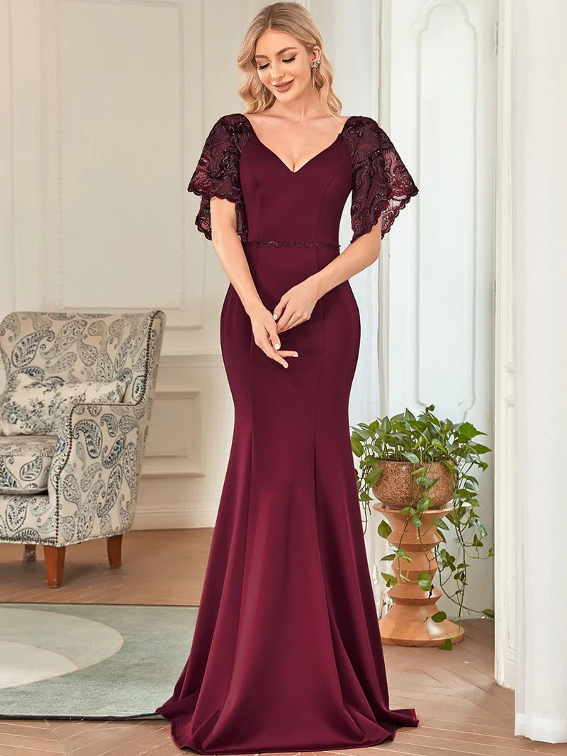 Burgundy red formal or mother of the bride dress with lace sleeves,v-neck and fishtail.