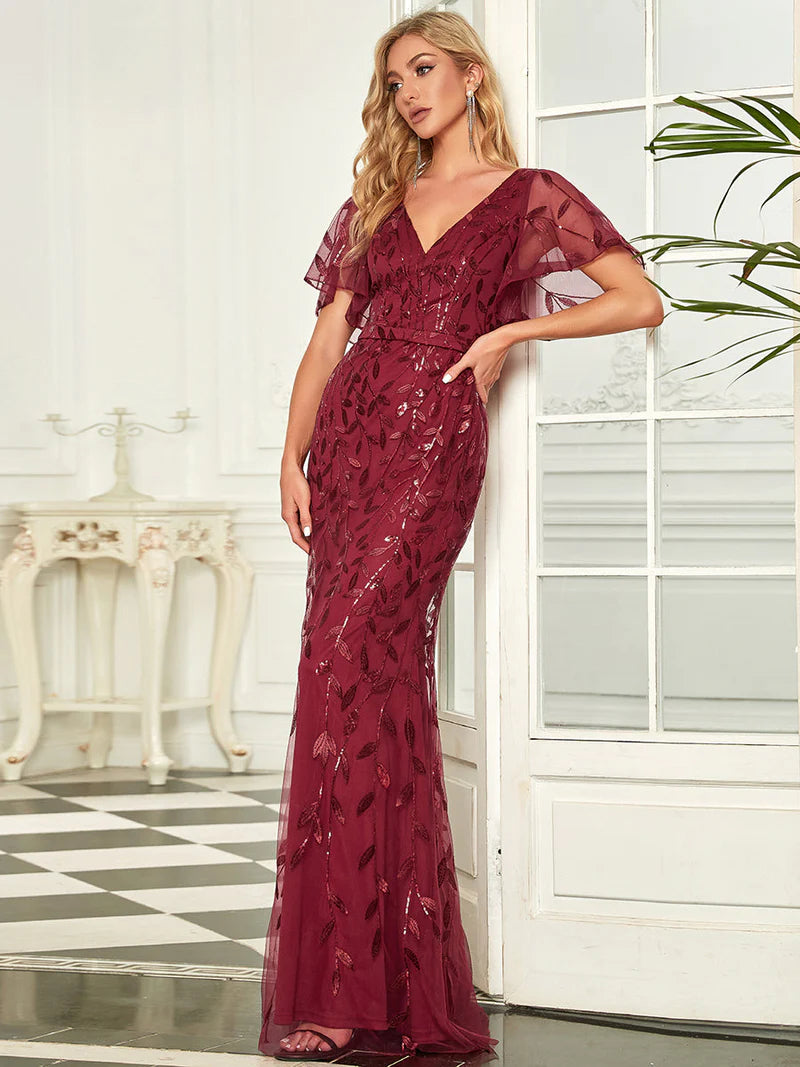 Burgundy red mother of the bride dress with tulle, sequins and lace ruffle sleeves.
