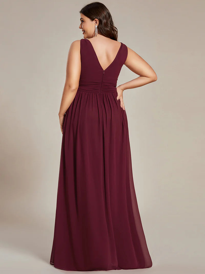 Burgundy red plus sized bridesmaid dress with double v-neck and chiffon.