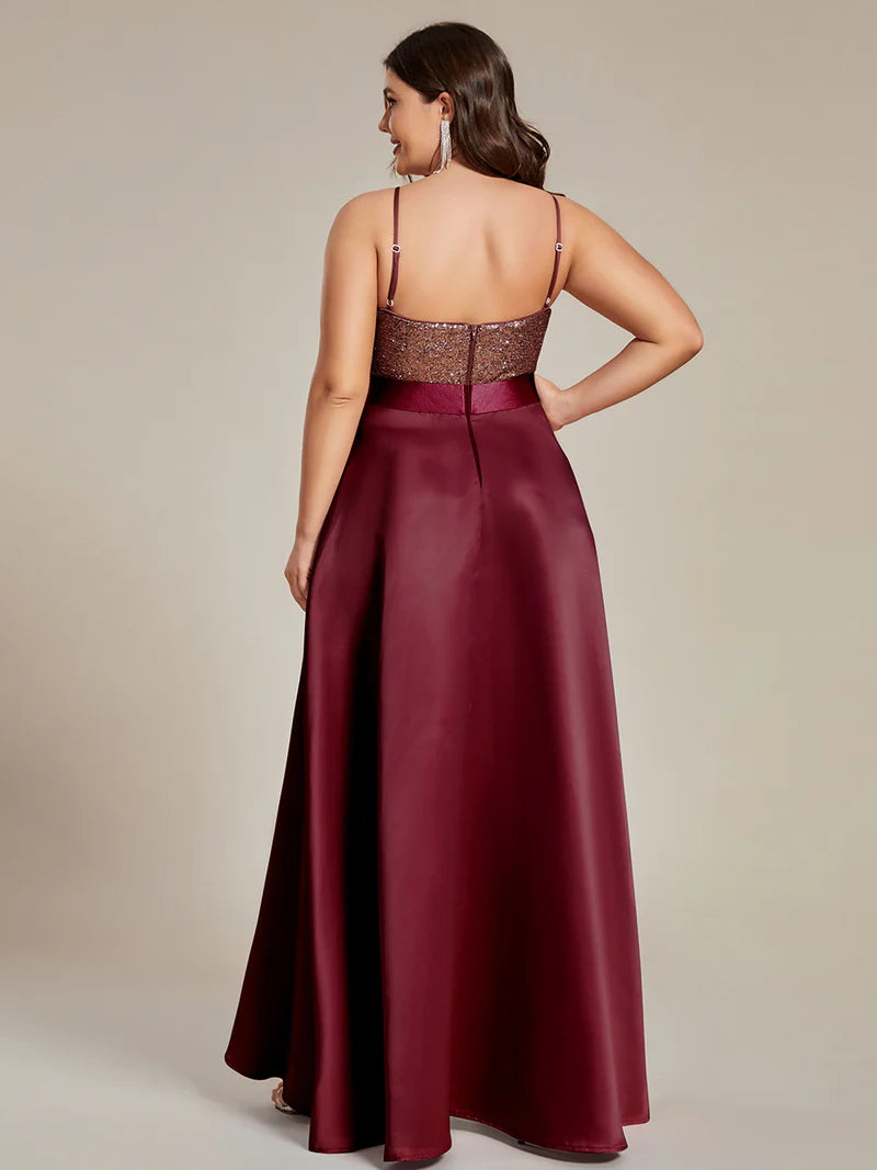 Burgundy red plus size hi low sleeveless satin formal or mother of the bride dress with bodice detailing.