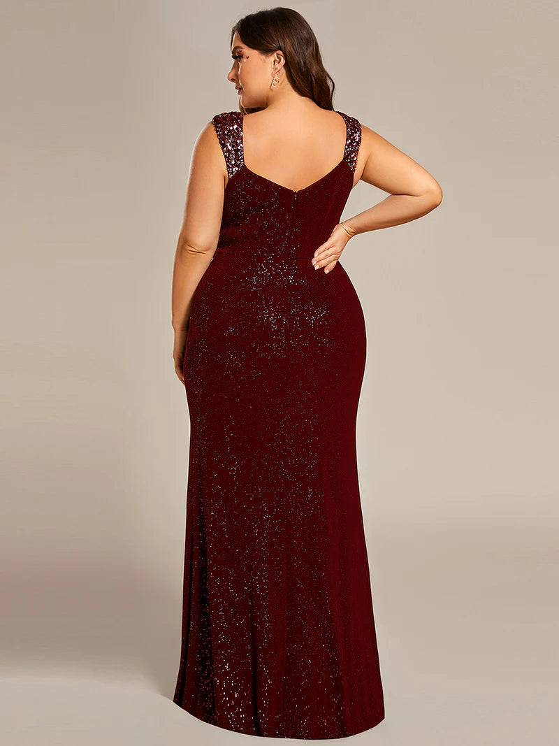 Burgundy red plus sized formal dress with glitter and split front.