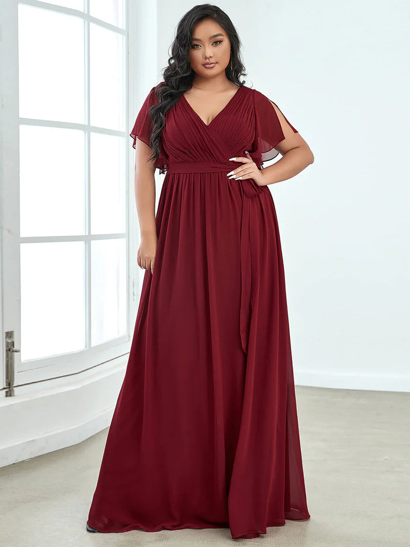 Burgundy red plus sized bridesmaid dress with v-neck and a-line.
