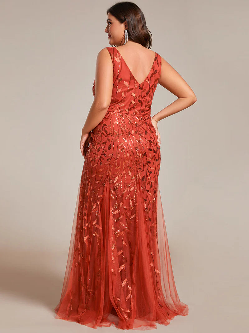 Burnt orange formal dress with fishtail and sequins.