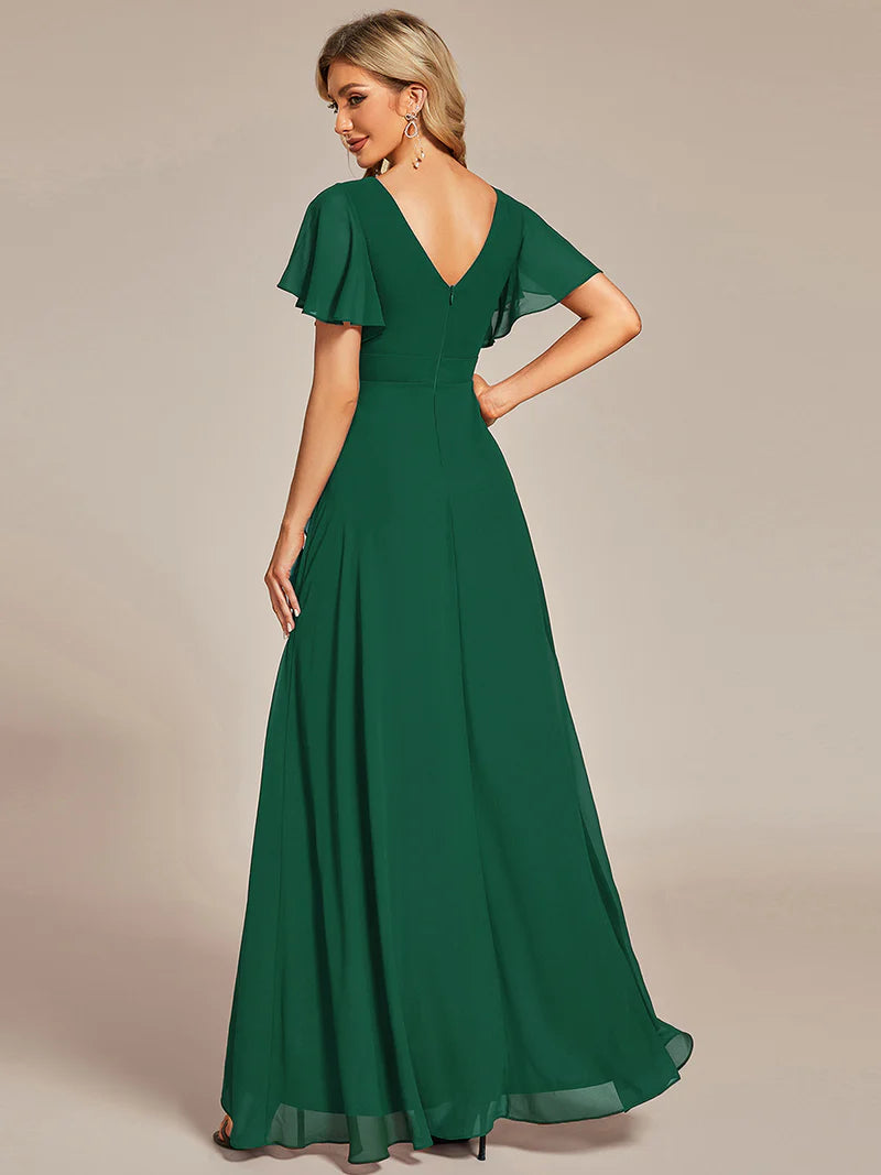 Dark green bridesmaid dress with high low ruffle and chiffon.