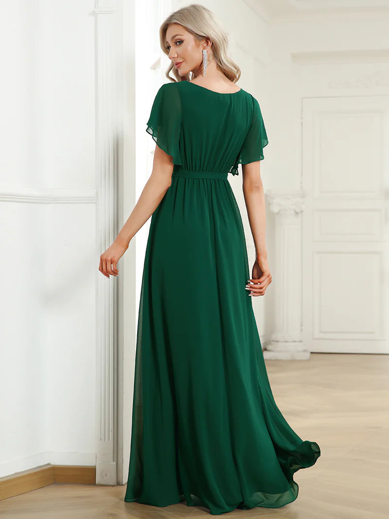 Dark green bridesmaid dress with v-neck and a-line.