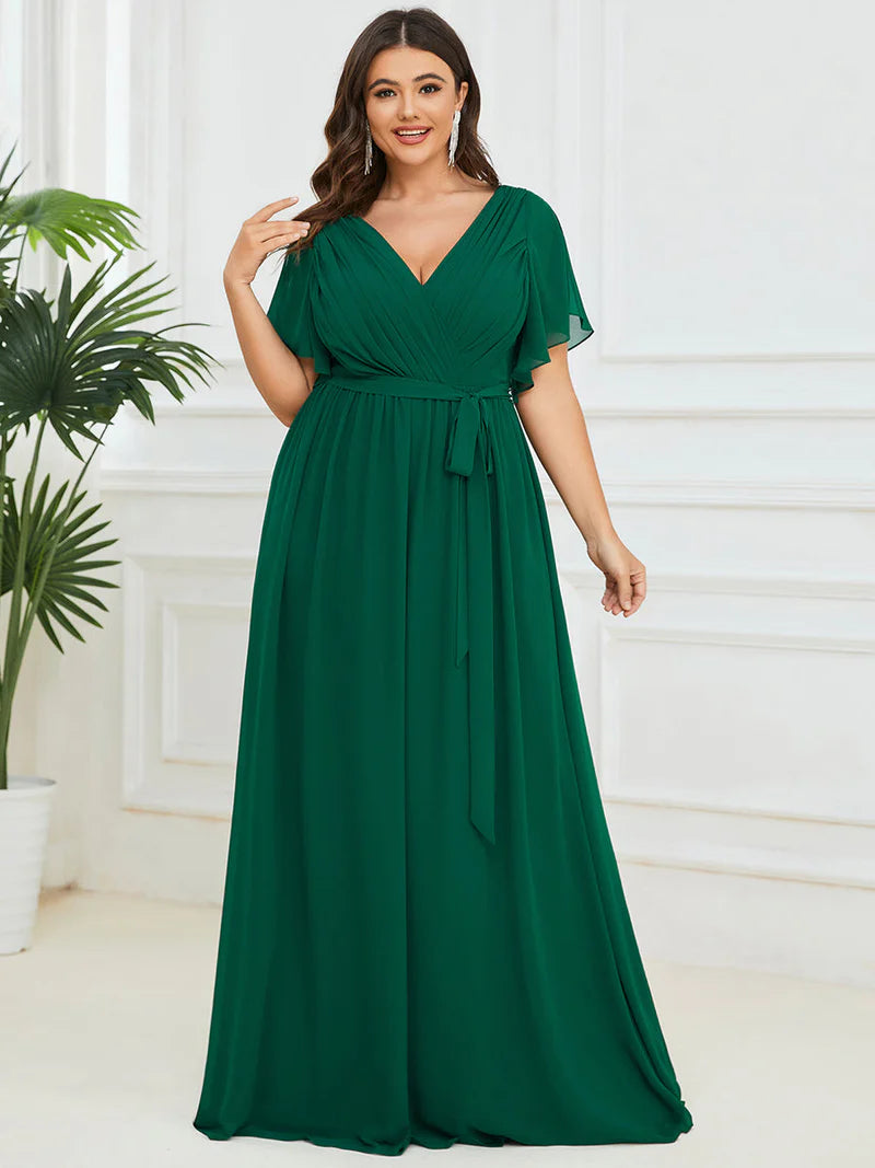 Dark green plus sized bridesmaid dress with v-neck and a-line.