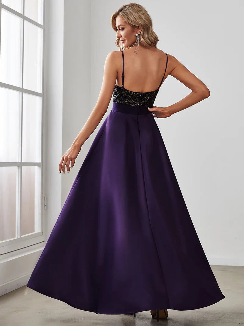 Deep purple hi low sleeveless satin formal or mother of the bride dress with bodice detailing.