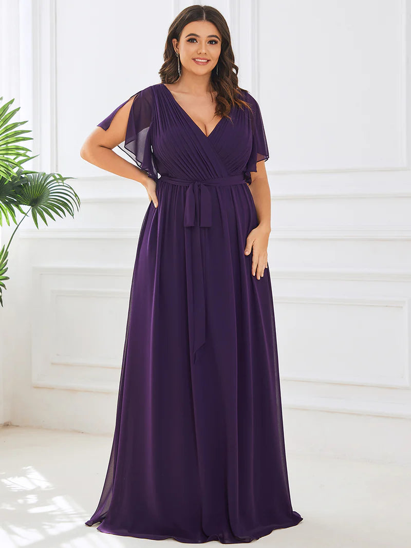 Deep purple plus sized bridesmaid dress with v-neck and a-line.