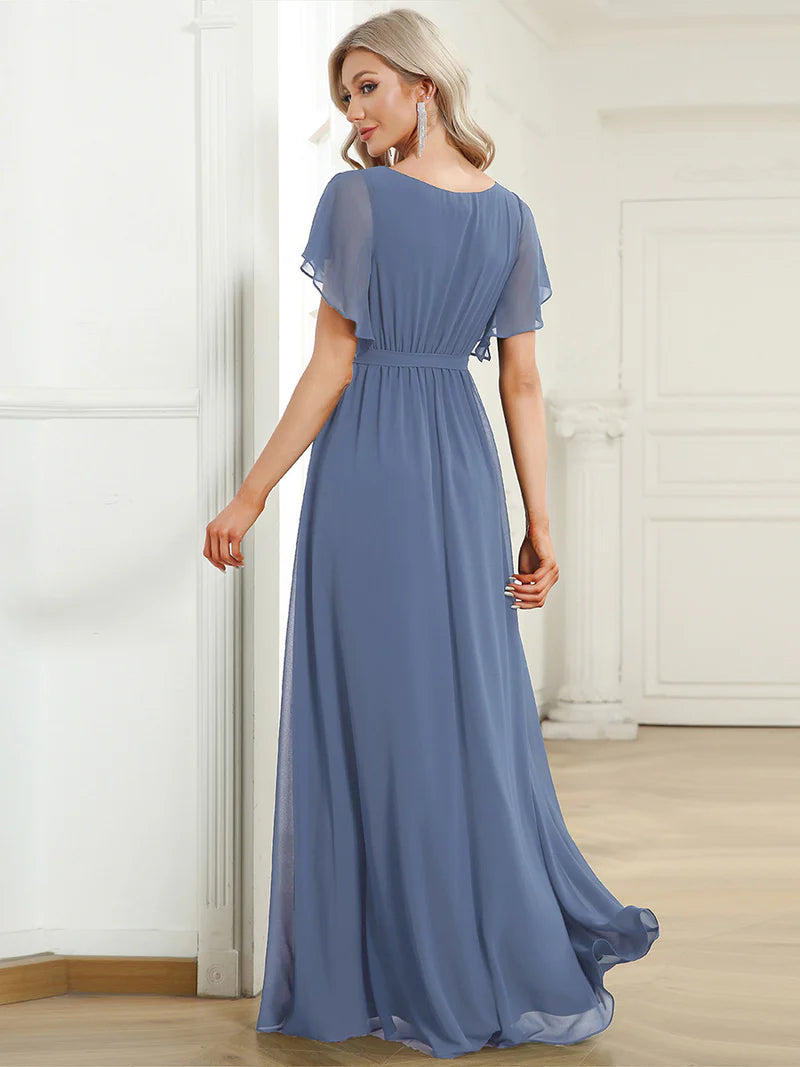 Dusty blue bridesmaid dress with v-neck and a-line.