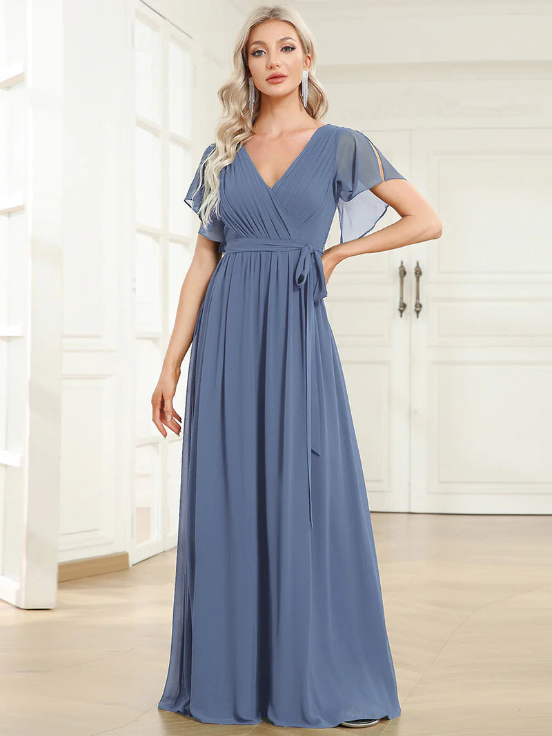 Dusty blue bridesmaid dress with v-neck and a-line.