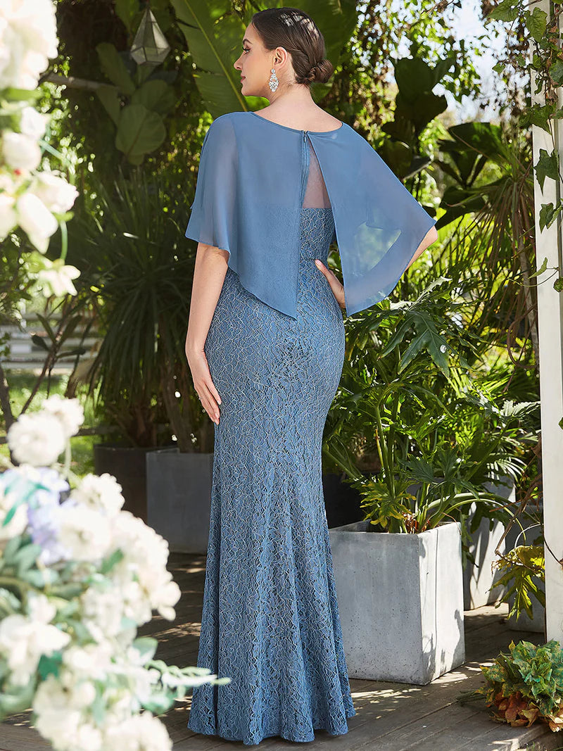 Dusty blue Mother of the Bride dress with fishtail finish, lace with chiffon cape ruffle sleeves.