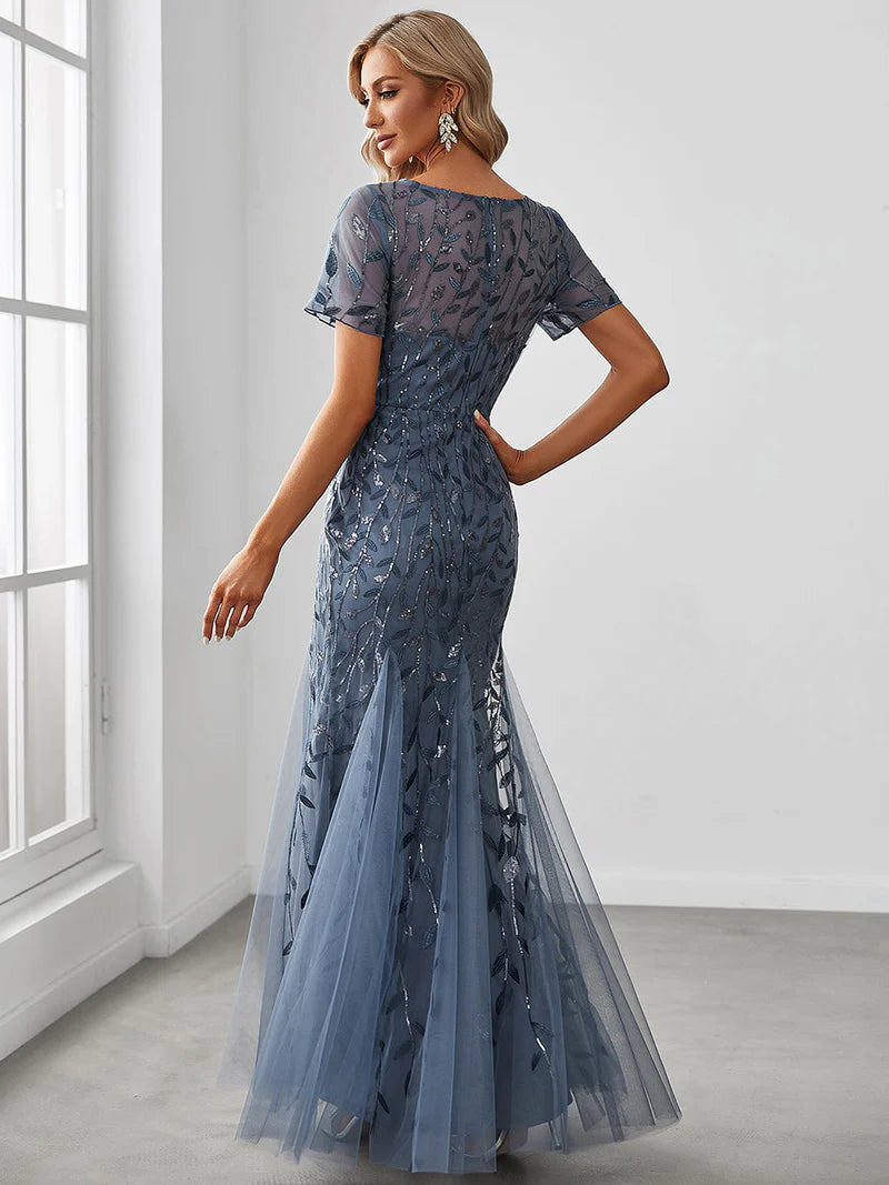 Dusty blue Mother of the bride dress, short sleeve with tulle, lace and sequin detailing.