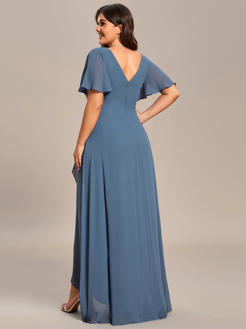 Dusty blue plus sized bridesmaid dress with high low ruffle and chiffon.