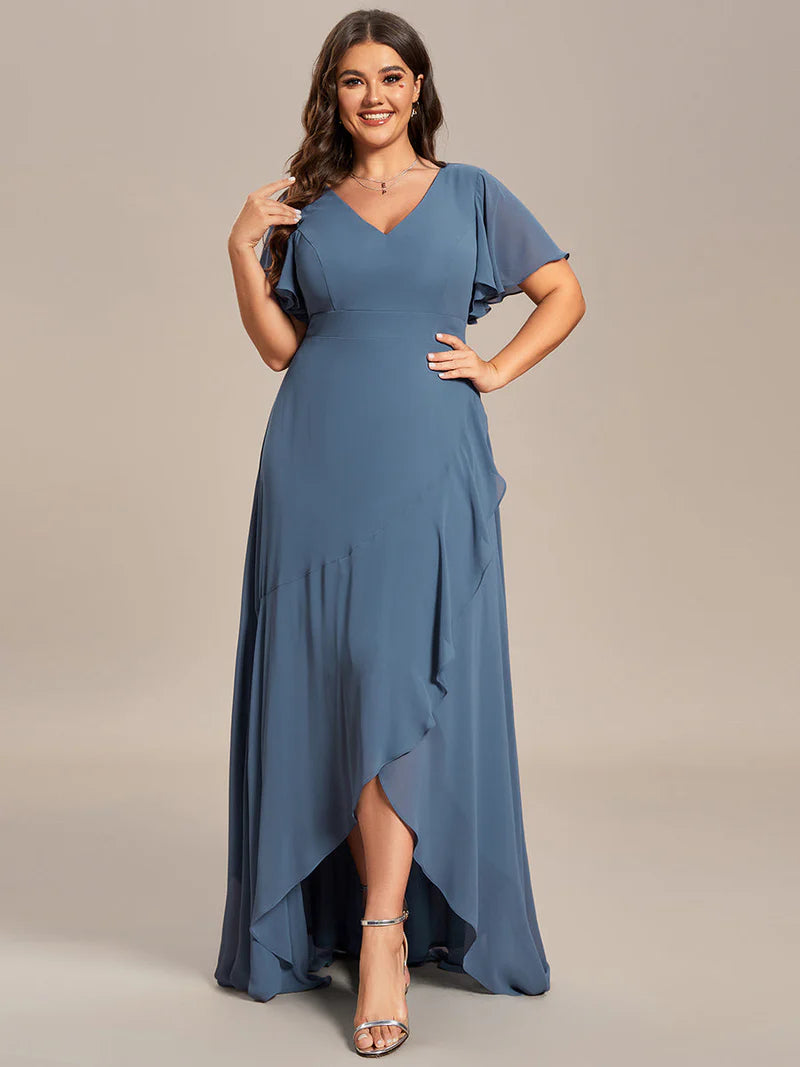 Dusty blue plus sized bridesmaid dress with high low ruffle and chiffon.