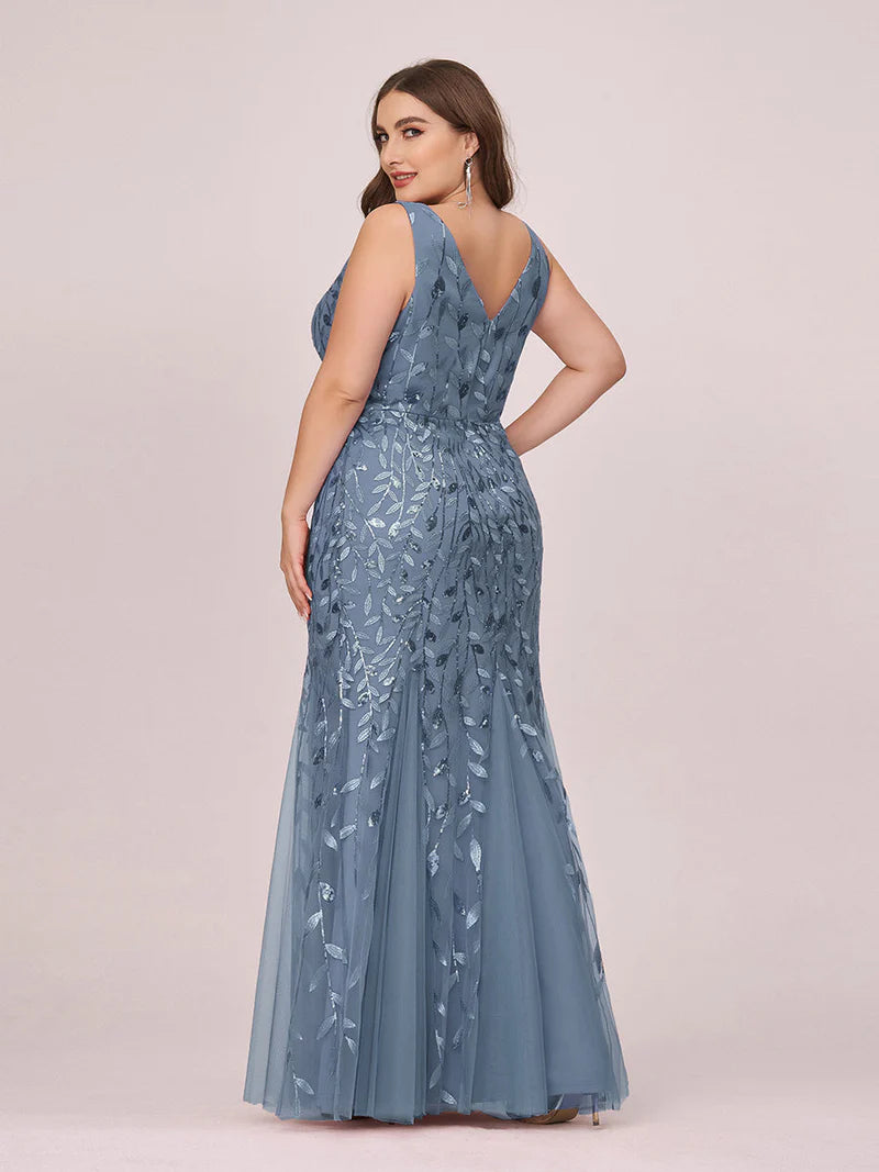 Dusty blue plus sized dress with fishtail and sequin.