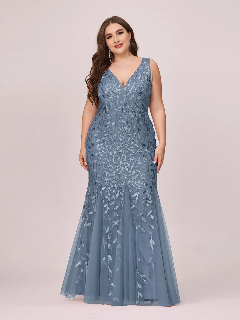 Dusty blue plus sized dress with fishtail and sequin.