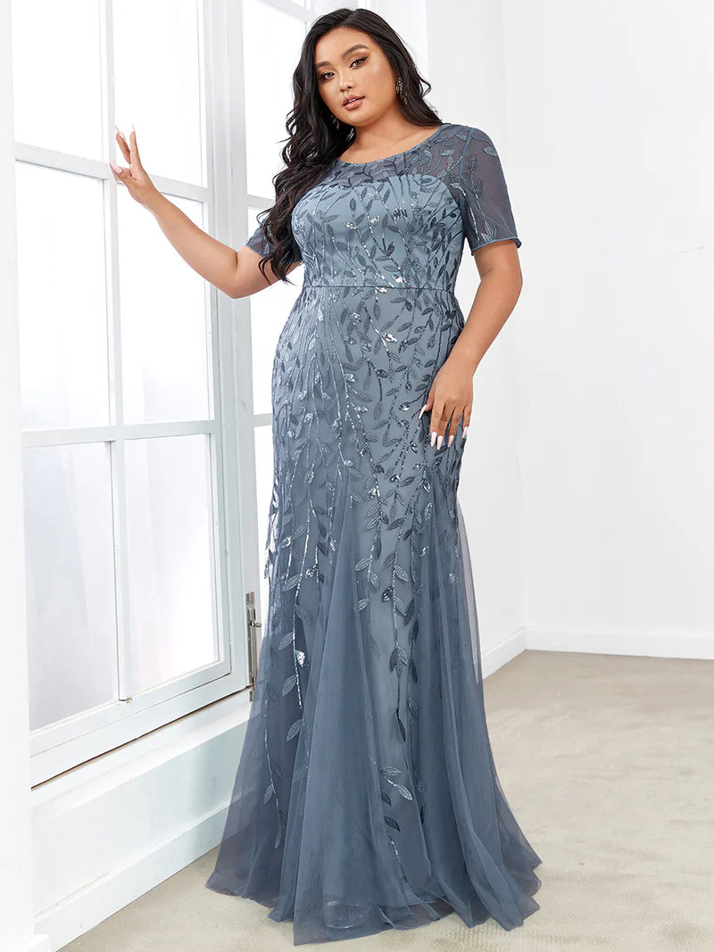 Dusty blue Plus Size Mother of the bride or formal dress, short sleeve with tulle, lace and sequin detailing.